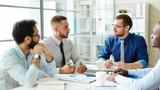 Insolvency & Business Rescue Lawyers – SWVG Inc. Business professionals in discussion about insolvency law and corporate rescue strategies at SWVG Inc.